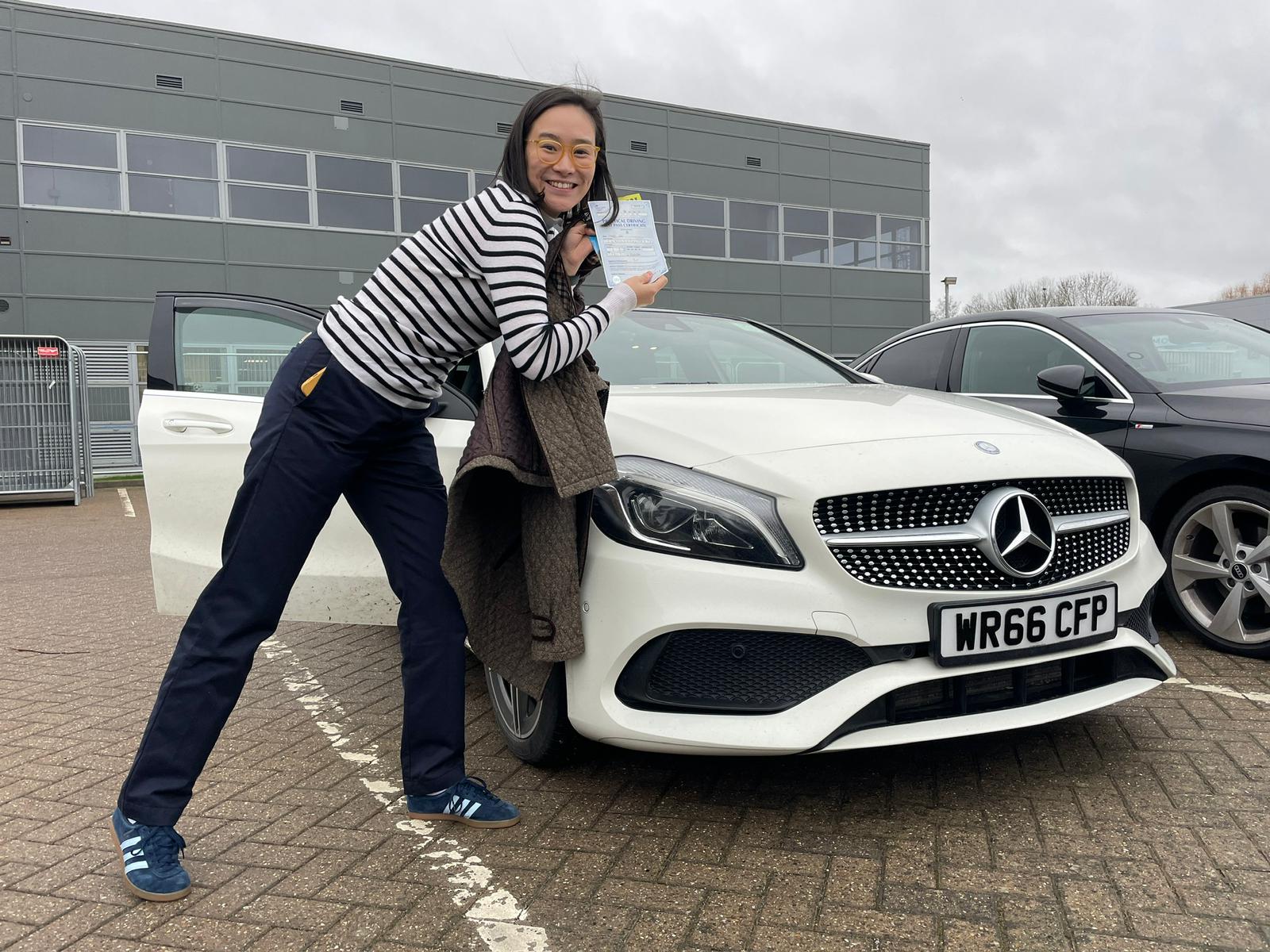 Passed student 5 celebrating their driving test success