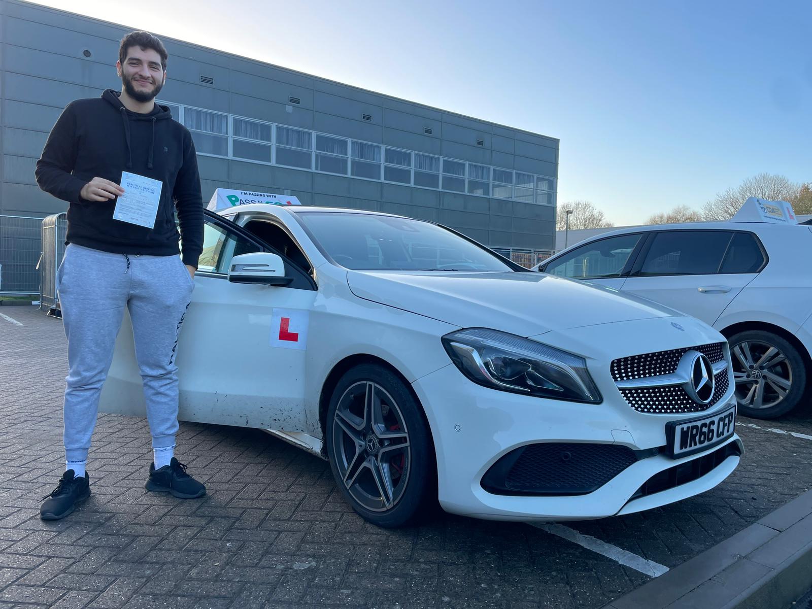 Passed student 8 celebrating their driving test success